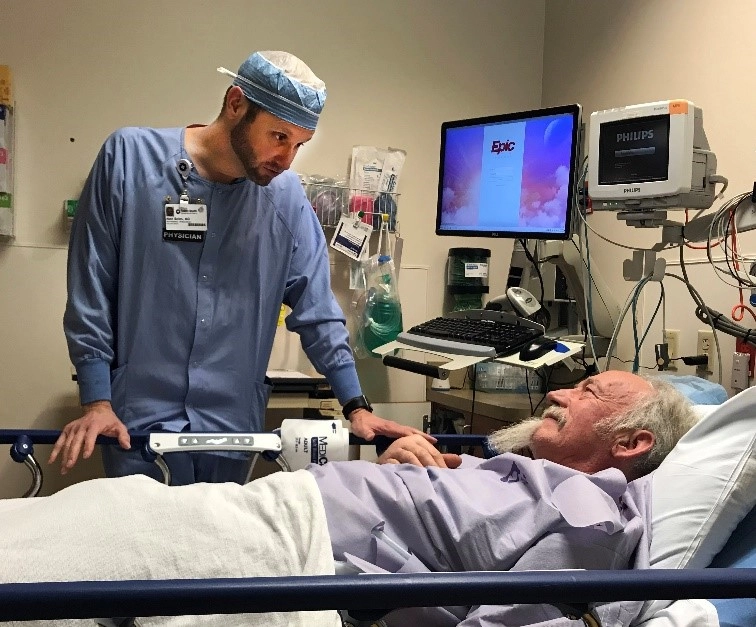 Dr. Boles and patient Dr. Boles and patient