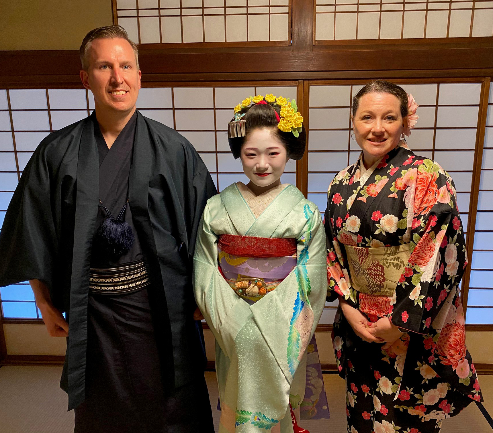Eric Laro, MD, with his wife and a geisha.