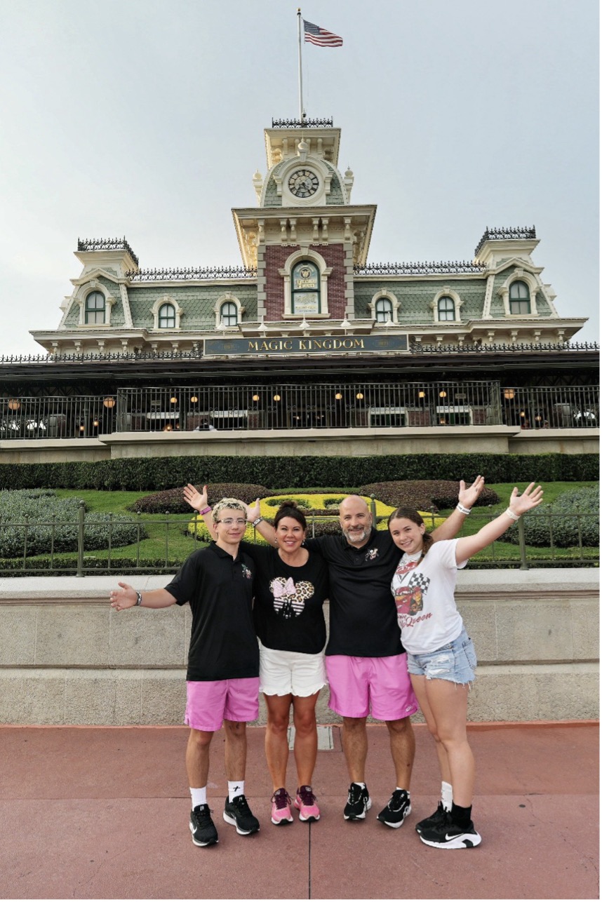 Picture4 Sarah Horn stands with her husband and two kids in front of Magic Kingdom.