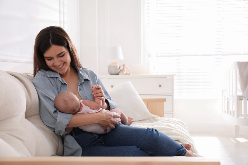 Mother feeding baby Mother feeding baby