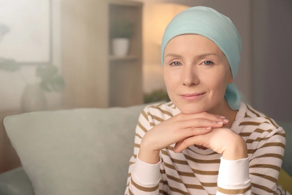 Woman hugging another woman with cancer