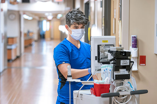 Nurse reviewing patient's chart