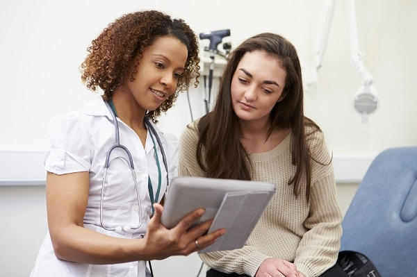 A nurse with career exploration program Job shadow student