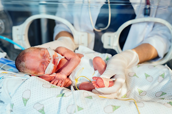 NICU patient getting massage