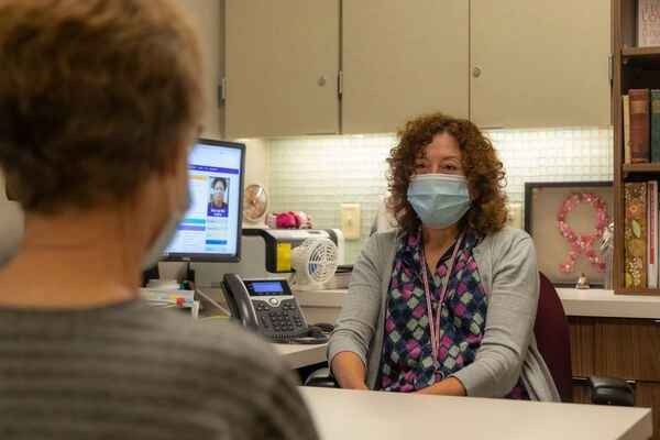 Patient meeting with a cancer nurse navigator