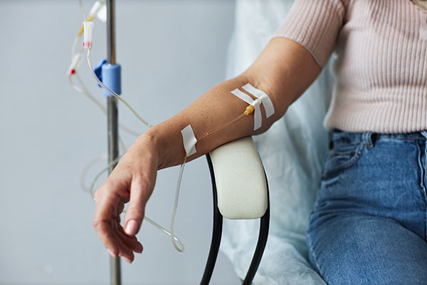 Patient receiving infusing treatment