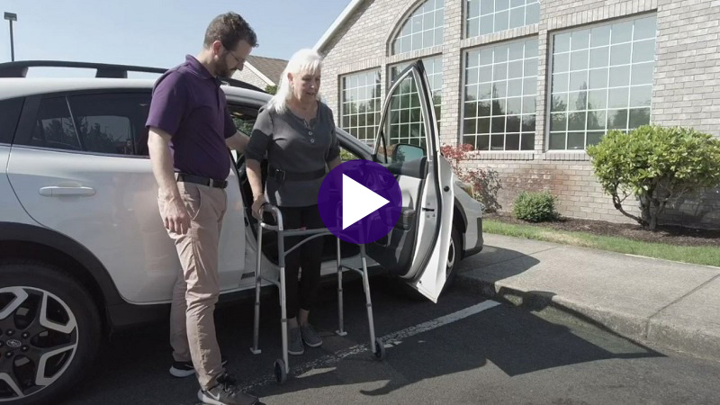 A thumbnail button to view a video about moving safely after joint replacement