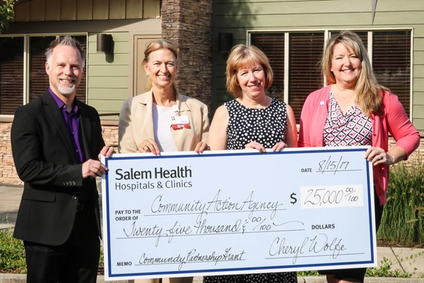 Pictured (L to R): Jon Reeves, MWVCAA executive director; Cheryl Wolfe, Salem Health president and CEO; Linda Mann, Capitol Dental director of community outreach; and Cyndi Leinassar, MWVCAA deputy director