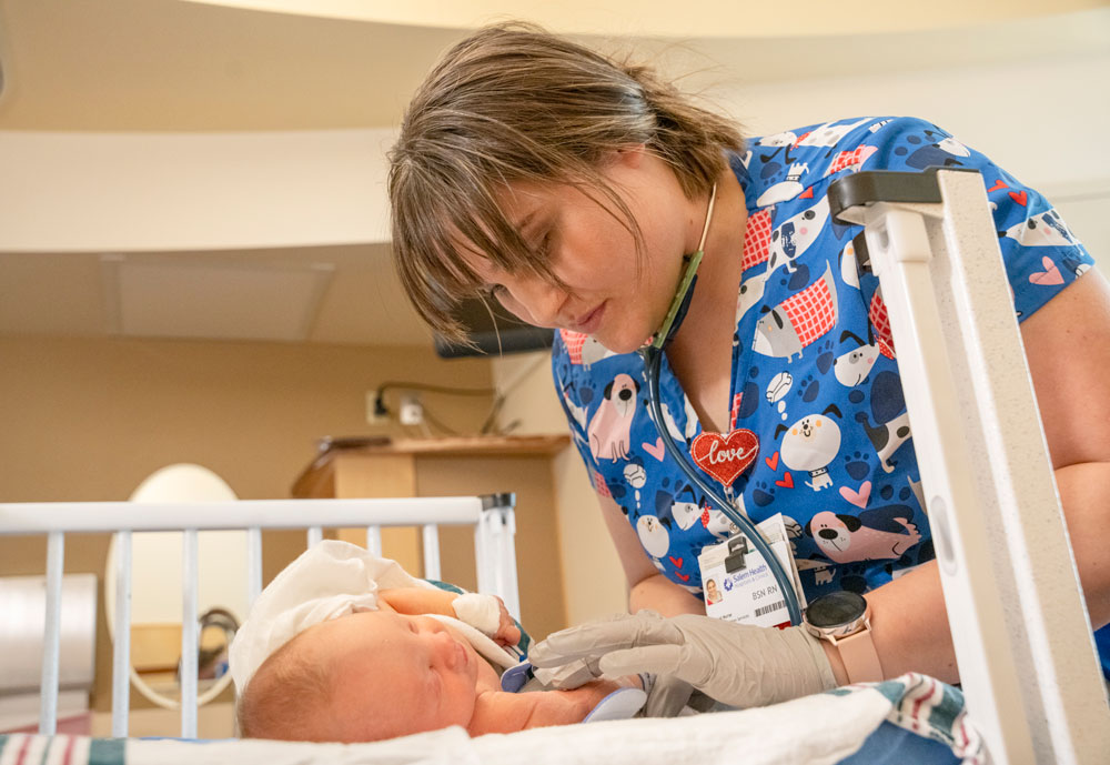Nurse taking care of a newborn