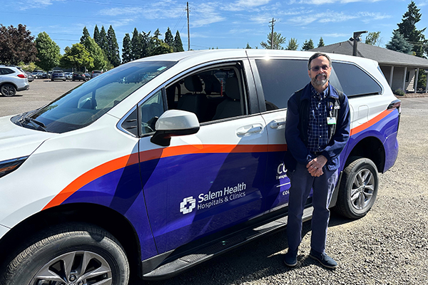 A driver with the Connections van