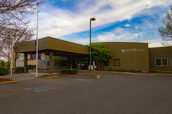 Exterior photo of West Valley Hospital main entrance.