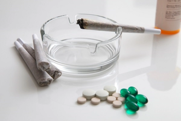 joint and pills marijuana and medicine
