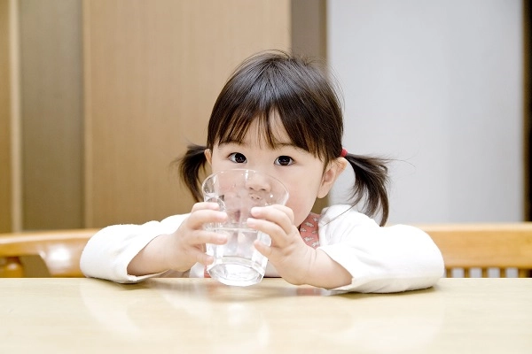 lead in water little girl with water