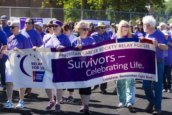 Relay for Life marching with banner