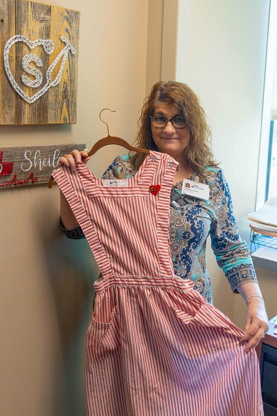 Sheila Loomis with her original candy striper uniform